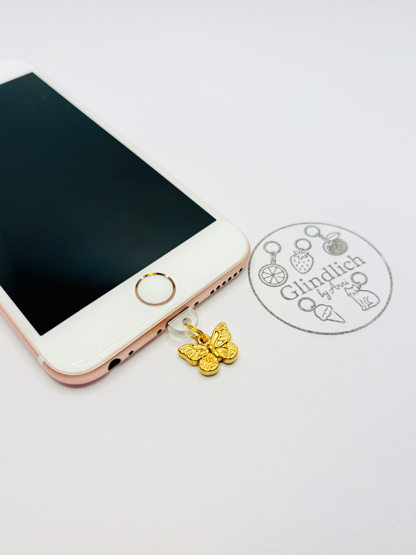 Schmetterling Mini Charm. Leichtigkeit und Wandel fürs Smartphone.
