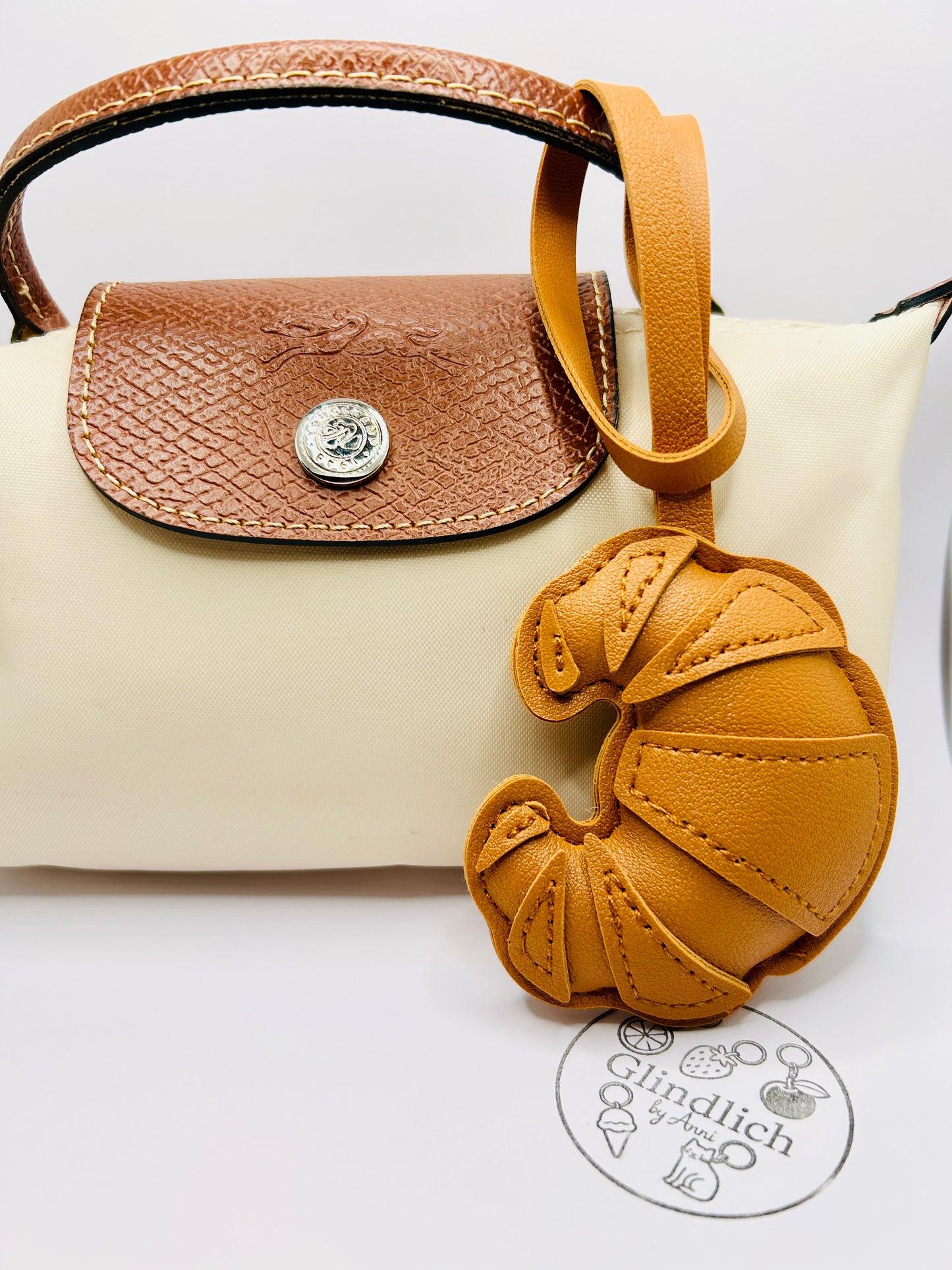 Croissant-shaped faux leather bag charm in Copenhagen style for bags and keys