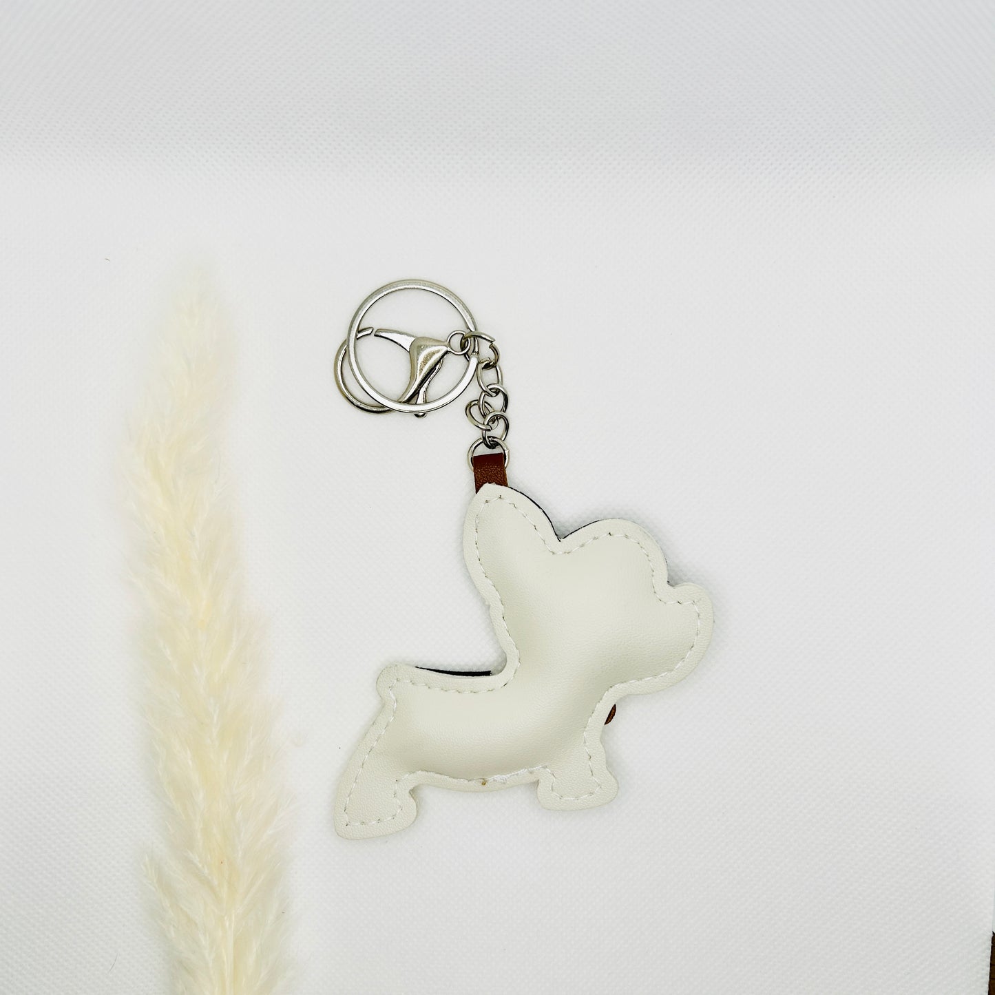 French Bulldog keychain. Black and white dog with strap and carabiner.