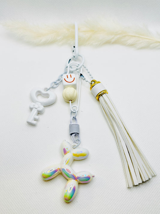 Ballonhund Schlüsselanhänger mit Tassel. Bunter Mini-Charm für Tasche, Schlüssel & Geschenkideen