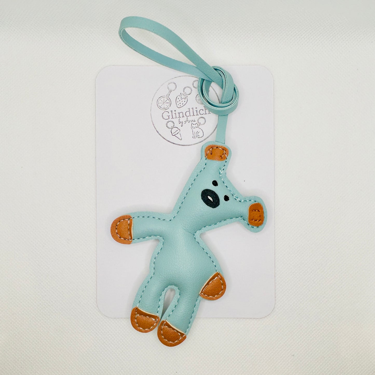 Teddy Taschenanhänger aus Kunstleder für Tasche Schlüssel und Rucksack in rosa, braun und Türkis