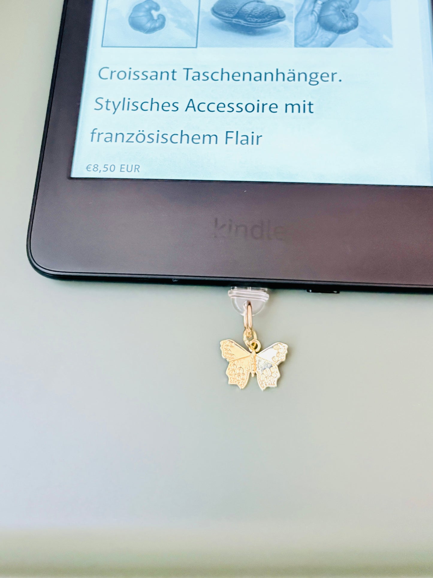 Schmetterling Charm aus Edelstahl. Minimalistisches Accessoire für Smartphone & Case.