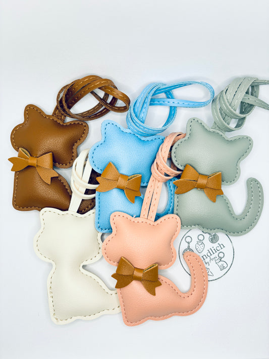 Cute cat bag charm. A perfect gift for her. Kawaii style. Cheerful and adorable. Bag charm.