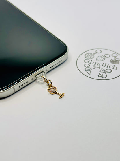 Cocktail glass charm made of gold-plated stainless steel. Minimalist accessory for smartphones and cases.