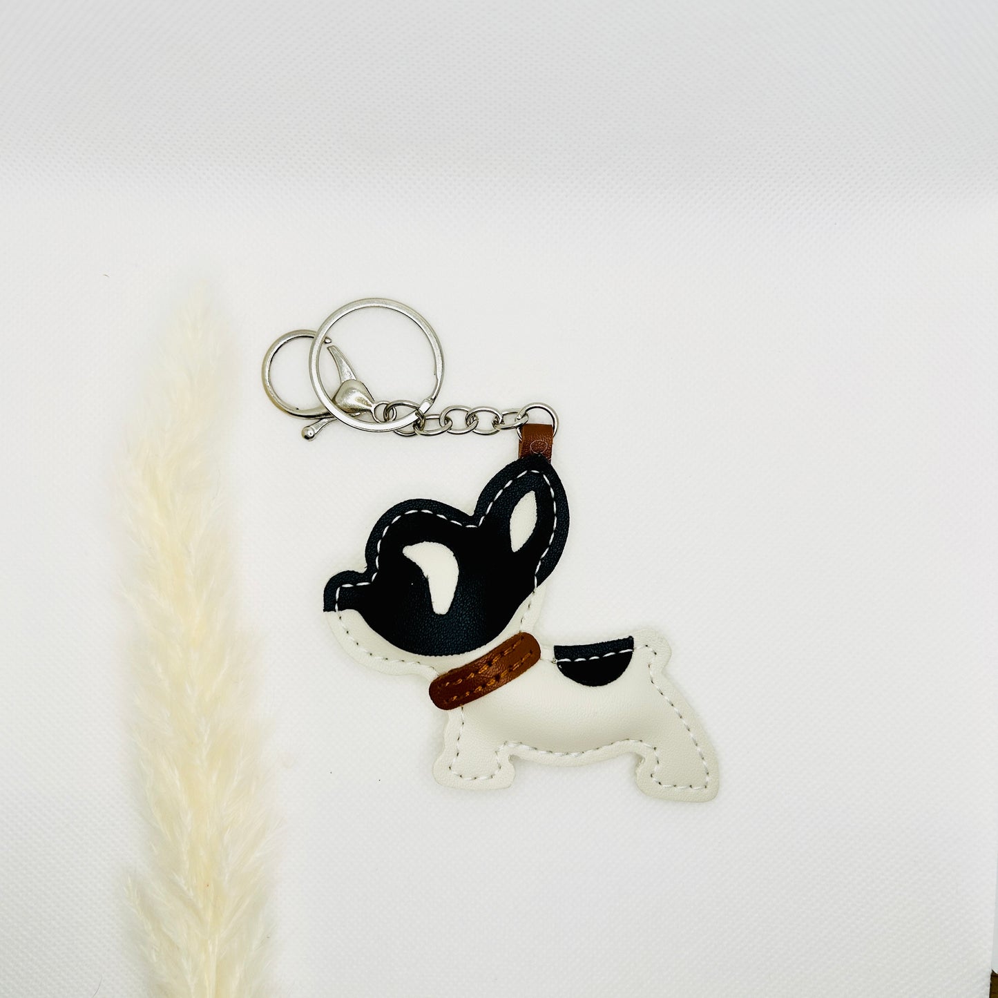 French Bulldog keychain. Black and white dog with strap and carabiner.