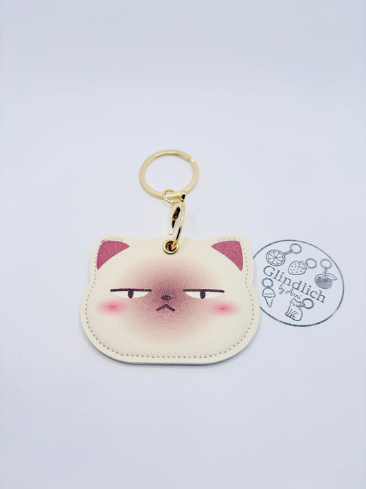 Mürrische Katze Schlüsselanhänger. Glücksbringer für dein GPS-Tracker.