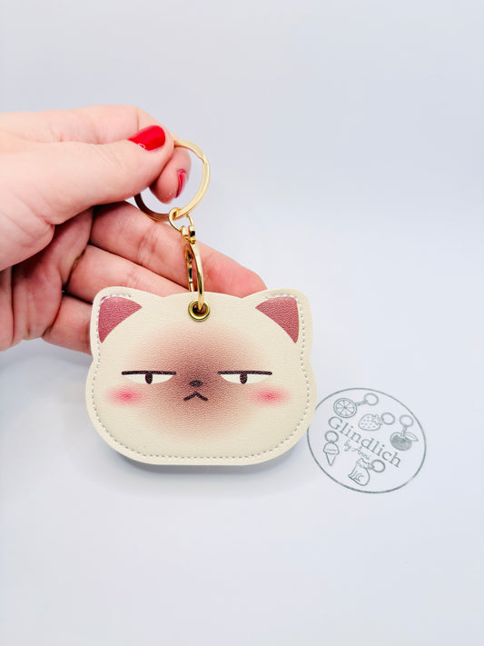 Mürrische Katze Schlüsselanhänger. Glücksbringer für dein GPS-Tracker.