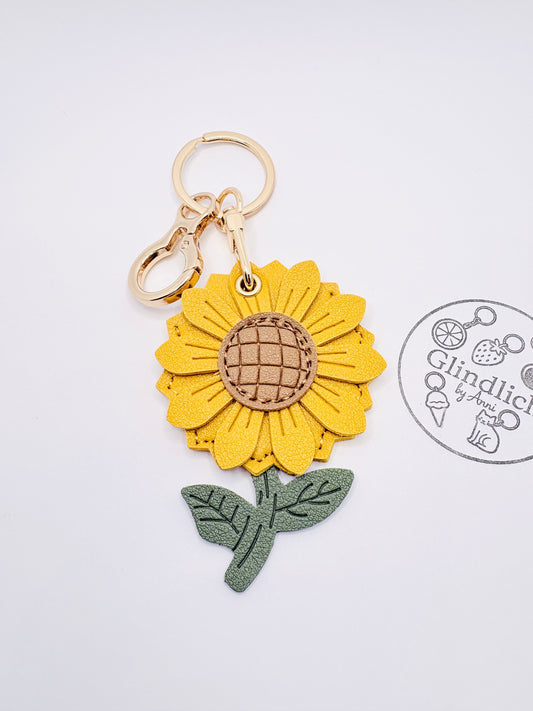 Sonnenblume Schlüsselanhänger. Summer Statement mit GPS-Tracker Fach