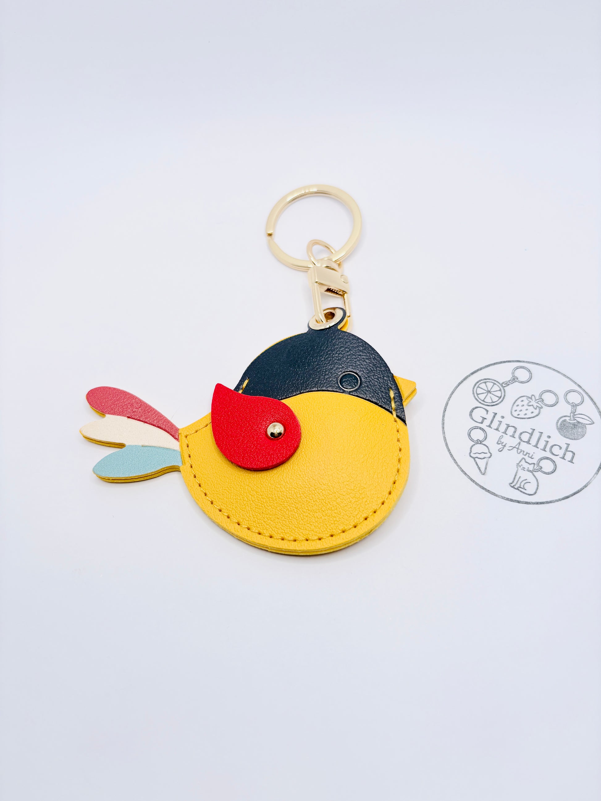 Vogel Bag Charm. Farbenfrohe Leichtigkeit für deinen Alltag.