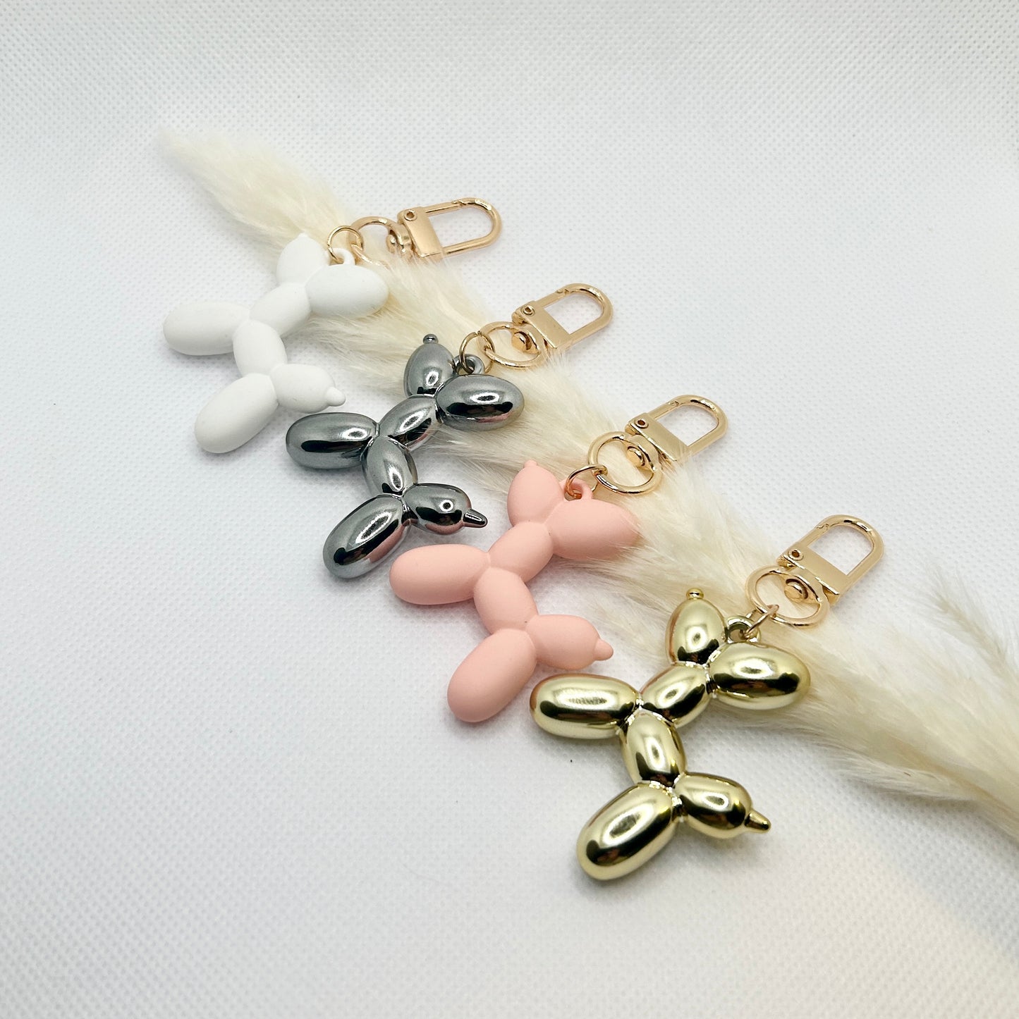 Ballonhund Schlüsselanhänger Bunt. Lustiges Accessoire für Tasche, Schlüssel oder Kopfhörer