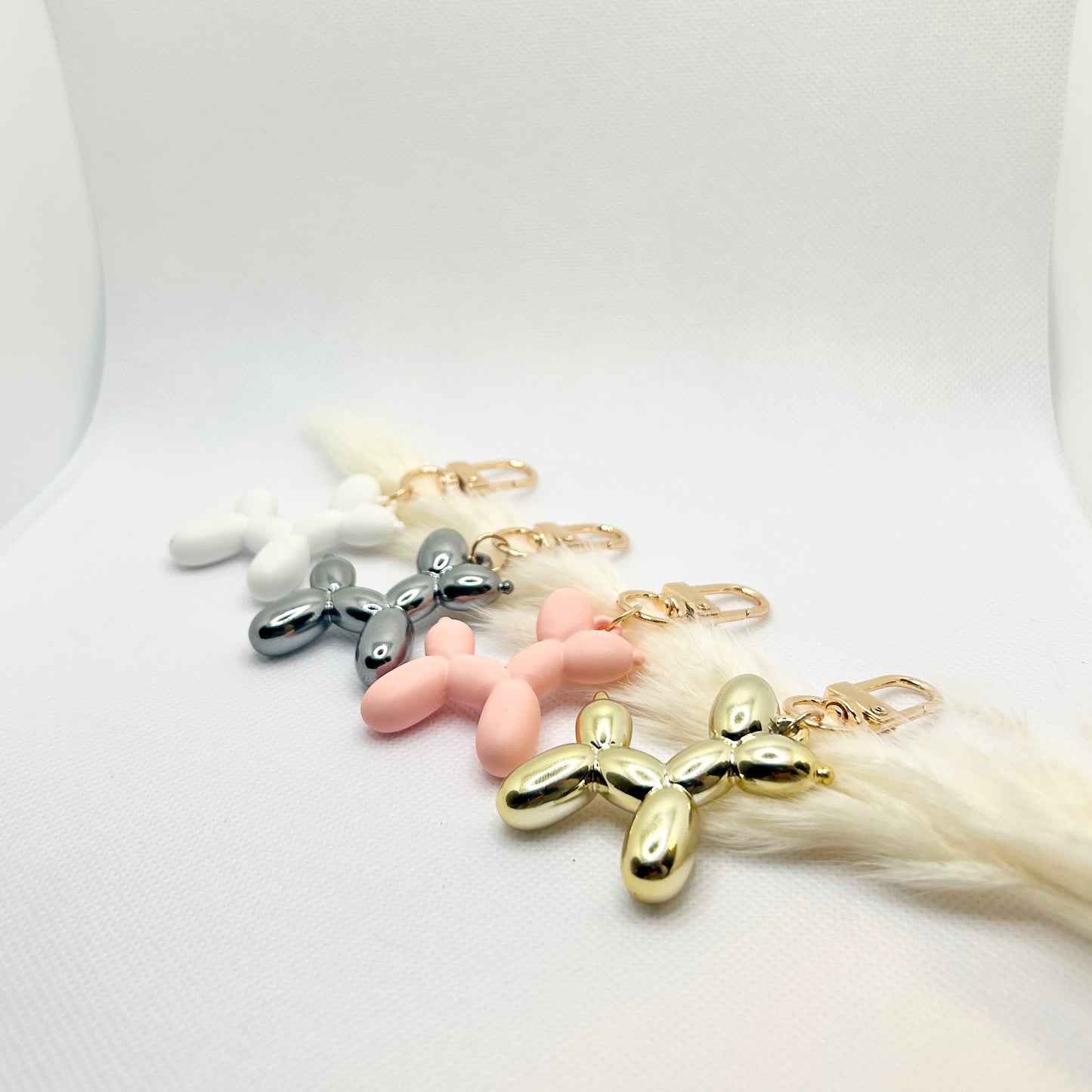 Ballonhund Schlüsselanhänger Bunt. Lustiges Accessoire für Tasche, Schlüssel oder Kopfhörer