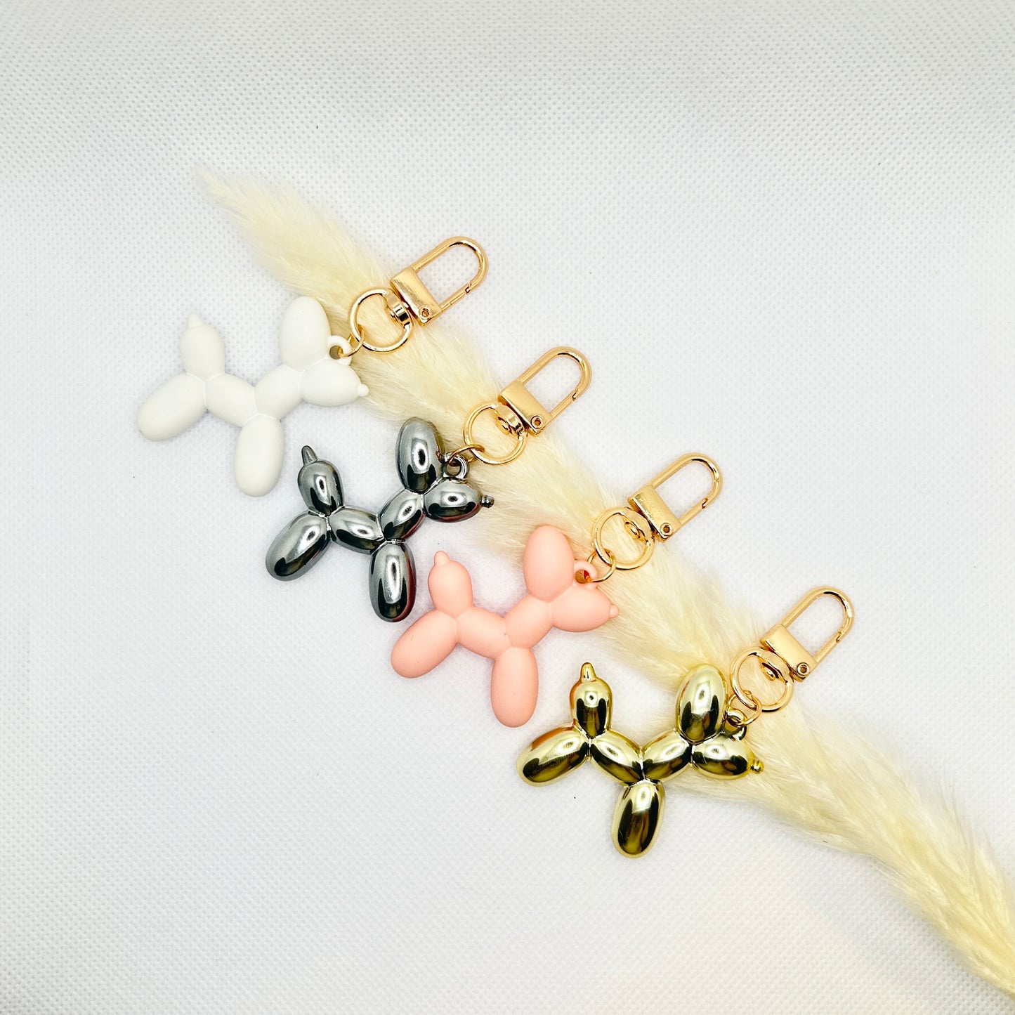 Ballonhund Schlüsselanhänger Bunt. Lustiges Accessoire für Tasche, Schlüssel oder Kopfhörer