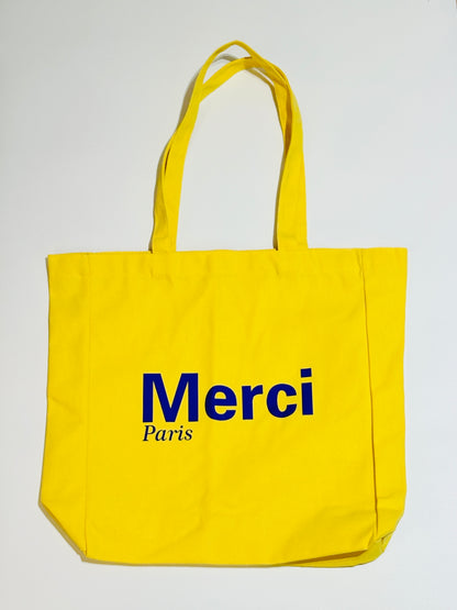 Merci Paris Tote Bag. Sonniges Statement mit französischer Leichtigkeit