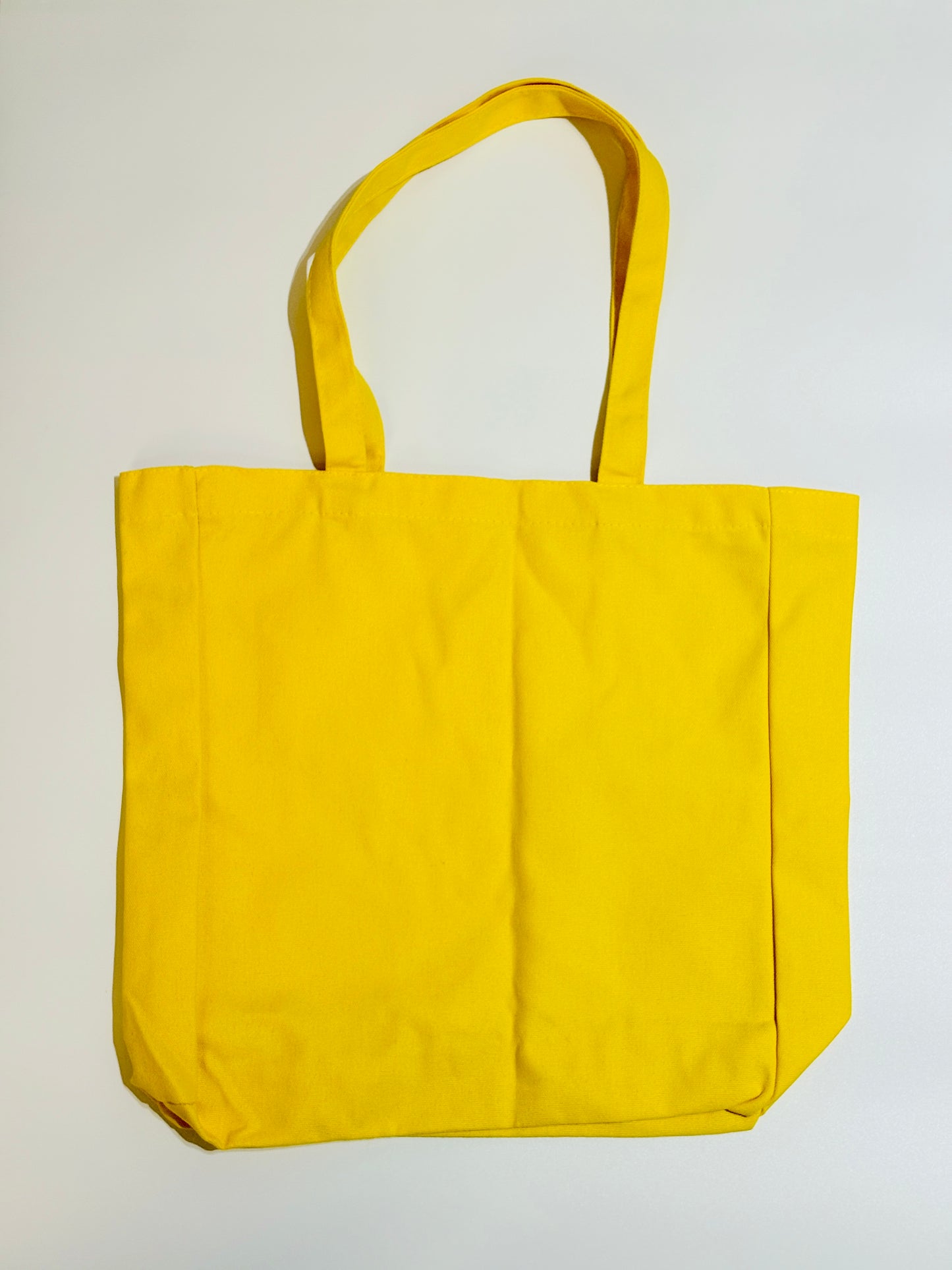 Merci Paris Tote Bag. Sonniges Statement mit französischer Leichtigkeit