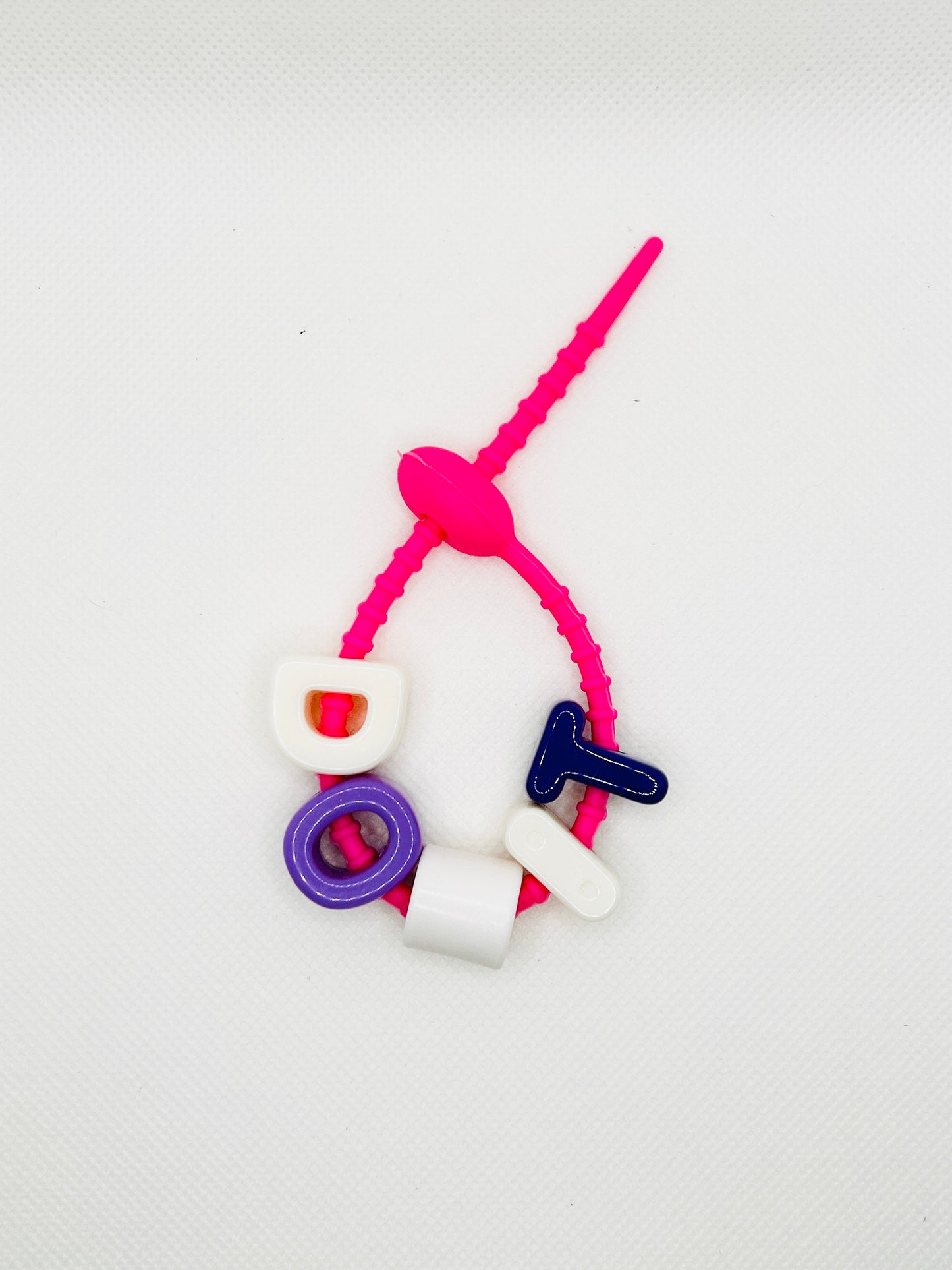 Acryl Buchstaben mit Silikonband. Bunt schrill