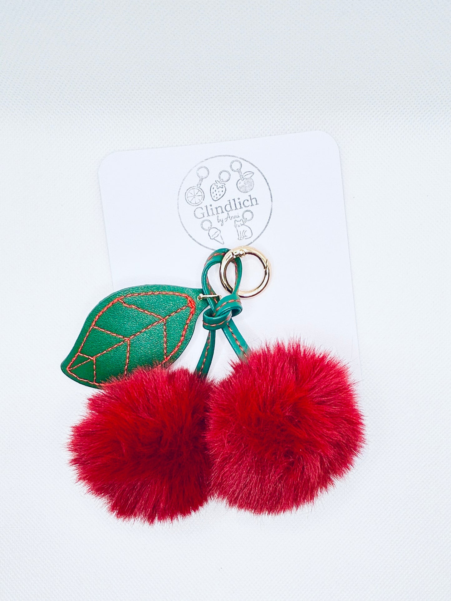 Kirsch Schlüsselanhänger flauschig Herbst Winter. Pompon Bag Charm rot. Geschenkidee Damen