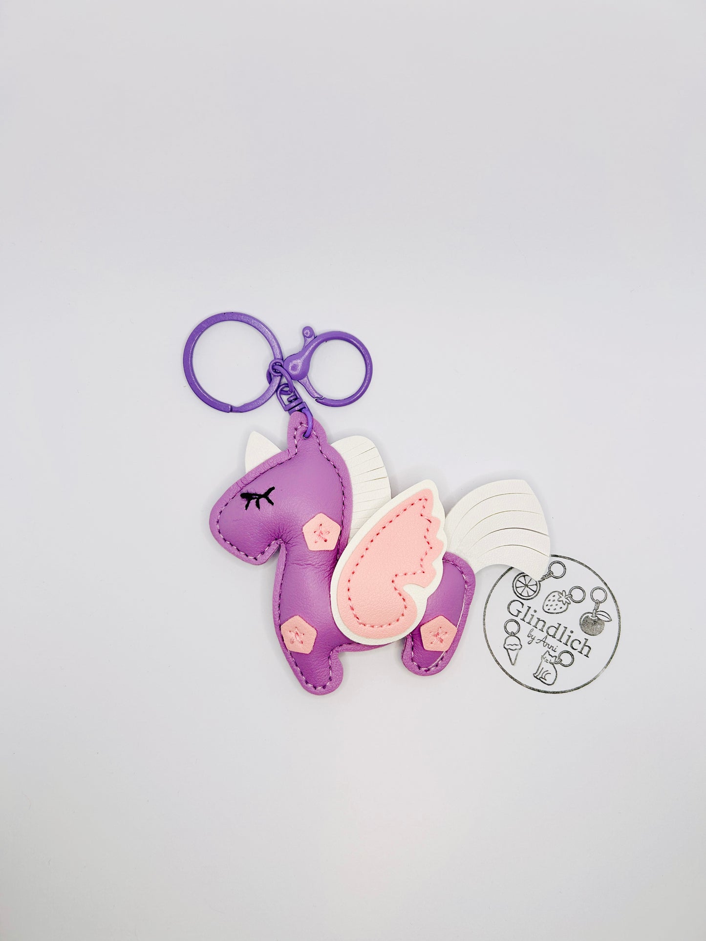 Einhorn Schlüsselanhänger Bunt. Märchenhaftes Accessoire mit Karabiner